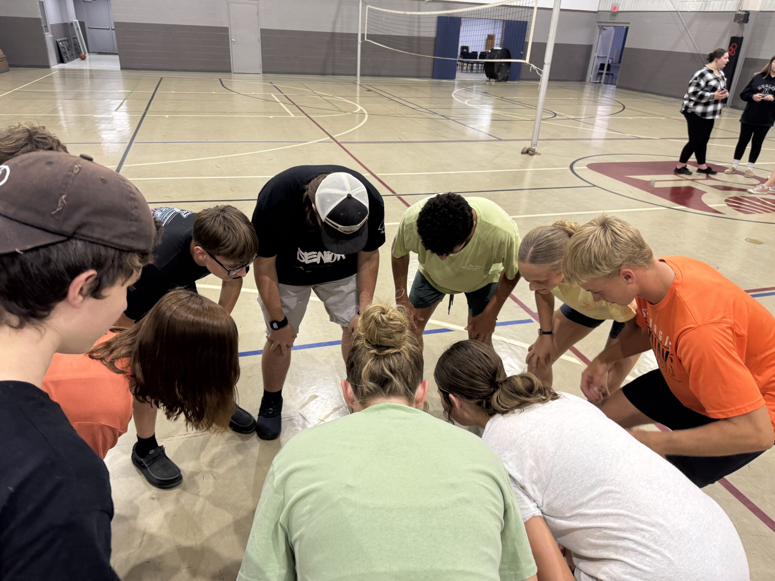 kids huddled in circle